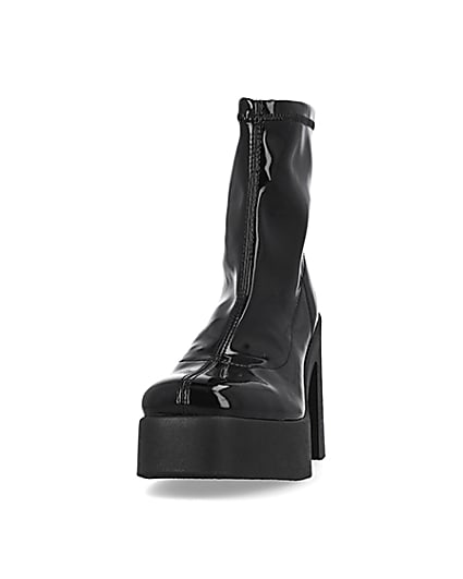 360 degree animation of product Black patent heeled biker boots frame-22