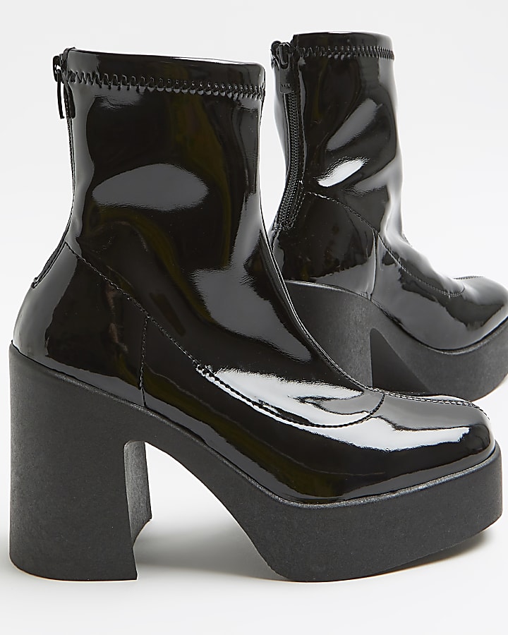 Black patent heeled biker boots