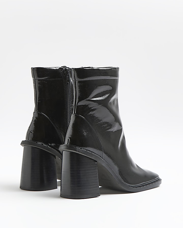 Black patent heeled sock boots