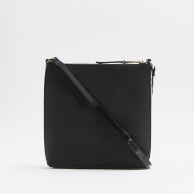 black patent messenger bag