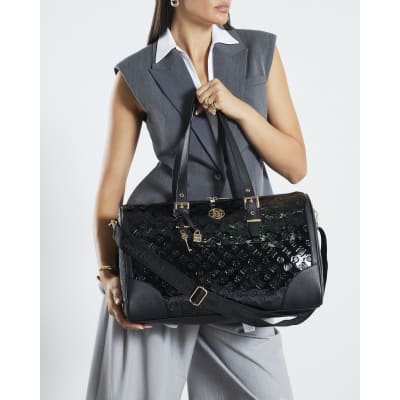 Black Patent Monogram Charm Holdall bag