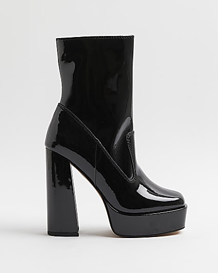 Black patent platform heeled ankle boots