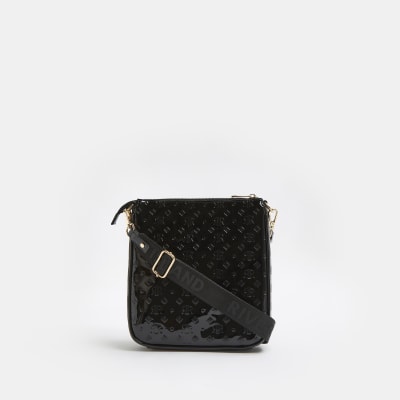 Black patent RI monogram messenger bag River Island