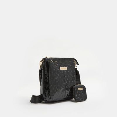 Black patent RI monogram messenger bag River Island