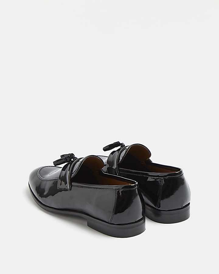 Black patent tassel loafers