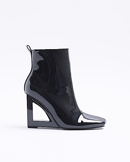 Black patent wedge heeled ankle boots