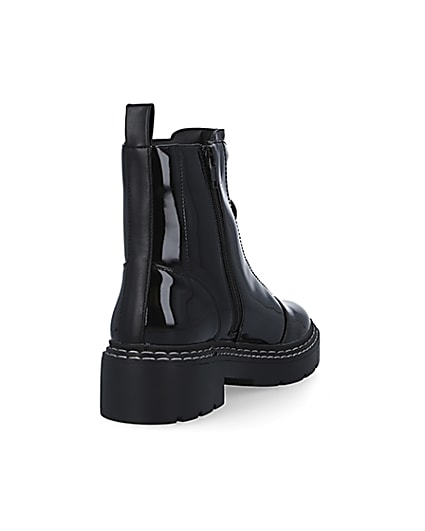 360 degree animation of product Black patent zip front chunky boots frame-11