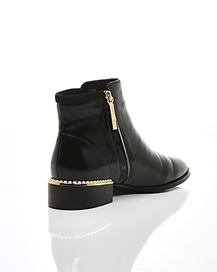 360 degree animation of product Black pearl embellished flat ankle boot frame-13