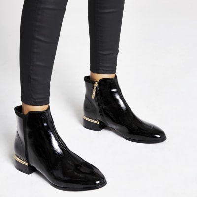 Black pearl embellished flat ankle boot 