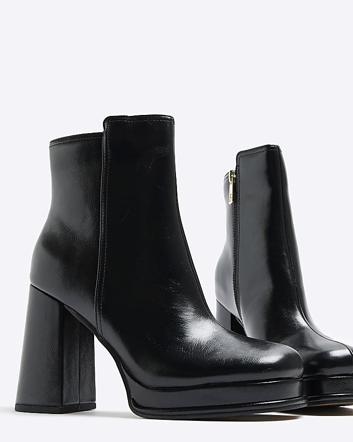 Black platform heeled ankle boots