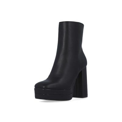 360 degree animation of product Black platform heeled ankle boots frame-0