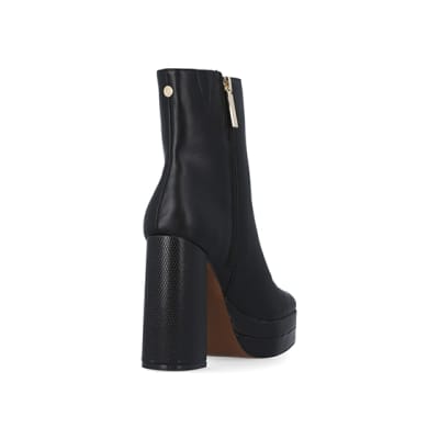 360 degree animation of product Black platform heeled ankle boots frame-11
