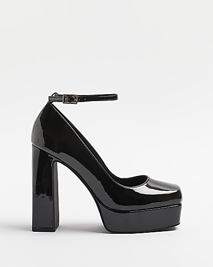 Black platform heeled mary jane shoes