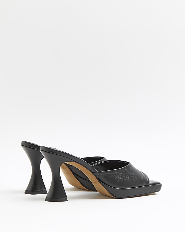 Black platform heeled mules