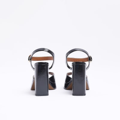 Black platform heeled sandals