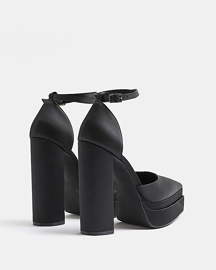 Black platform heeled shoes