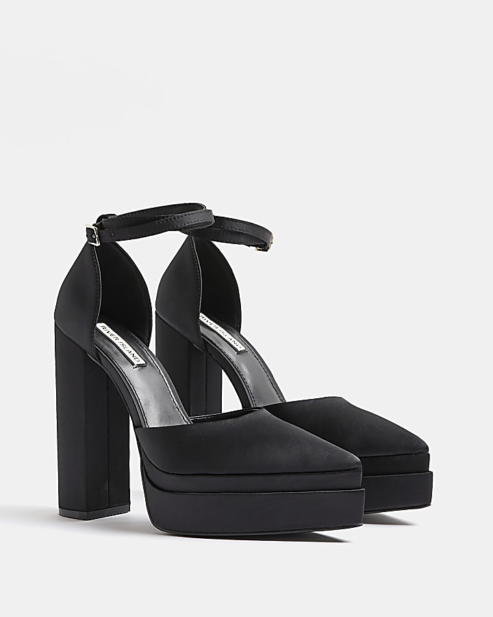 Black platform heeled shoes