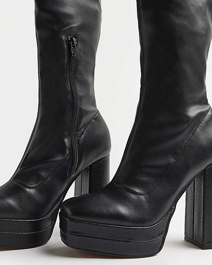 Black platform knee high boots