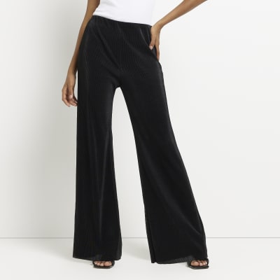 Black plisse flared trousers | River Island