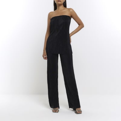 Black plisse flared trousers River Island