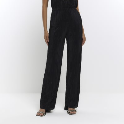 Black plisse flared trousers | River Island