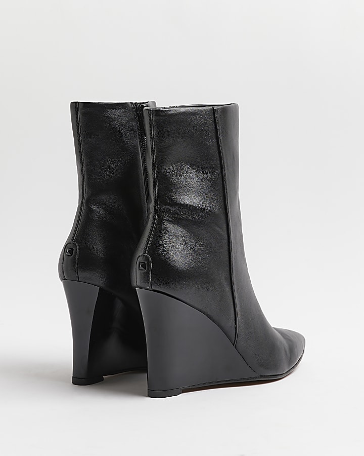 Black pointed toe wedge ankle boots