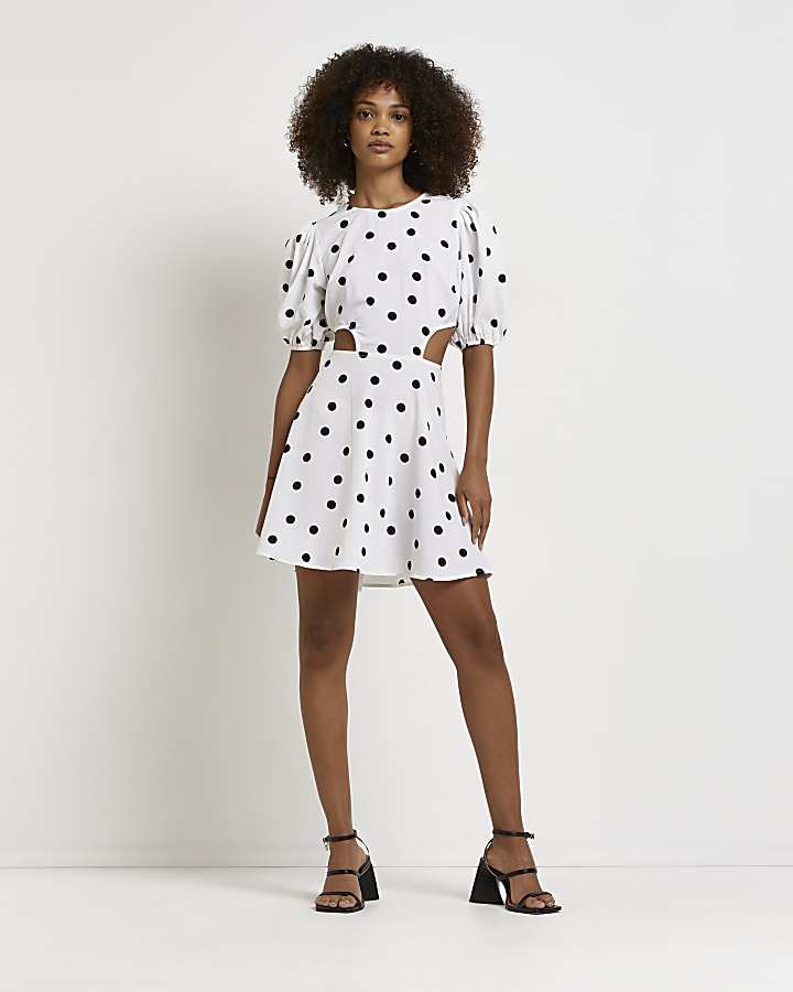 Black polka dot cut out mini dress
