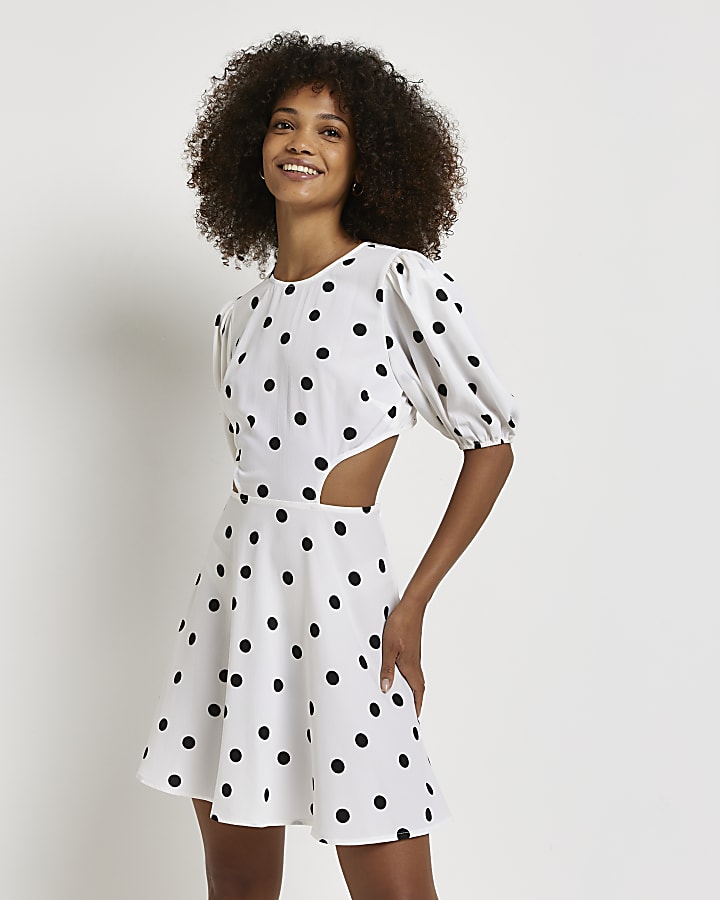 Black polka dot cut out mini dress