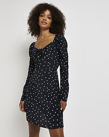 Black polka dot mini dress