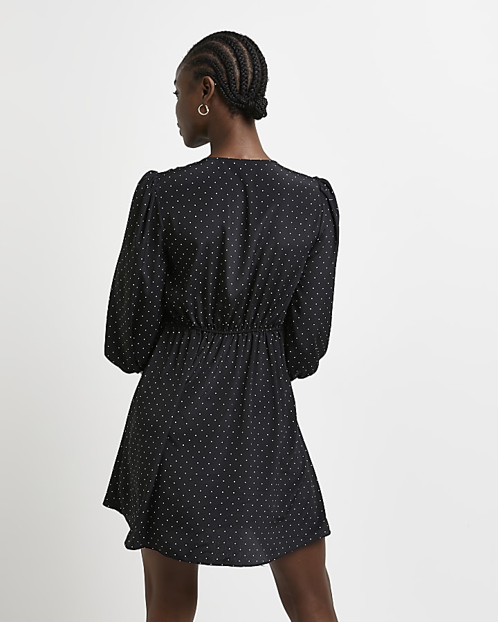 Black polka dot twist front mini dress