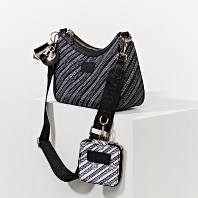 Black pouchette RI chain cross body handbag | River Island