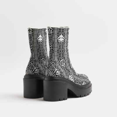 Black print ankle sock boots River Island