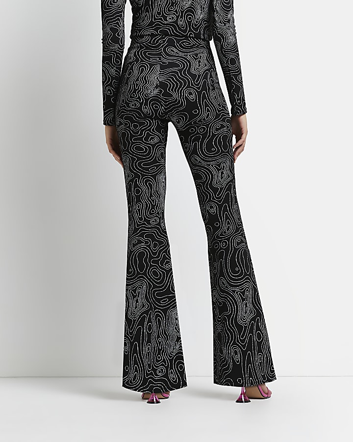 Black printed jacquard flared trousers