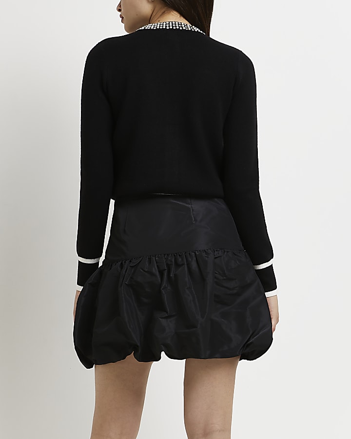 Black puffball hem mini skirt
