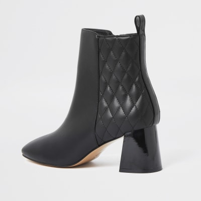 Black quilted block heel boots