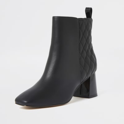 Black quilted block heel boots