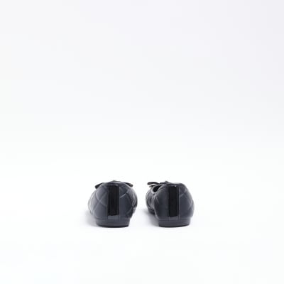 Black quilted bow ballerina shoes