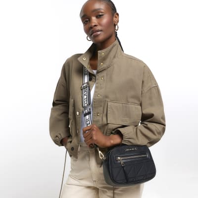 Black quilted camera cross body bag River Island