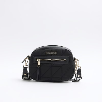 Black quilted camera cross body bag River Island