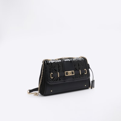 Black quilted chain strap shoulder bag River Island