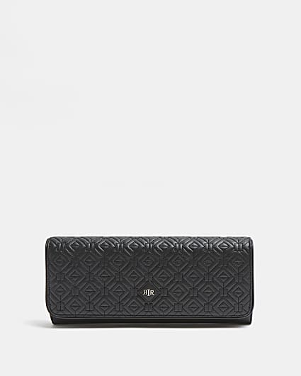 Black quilted clutch bag