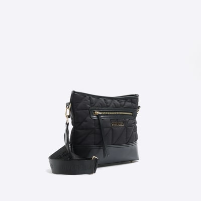 Black quilted cross body bag River Island