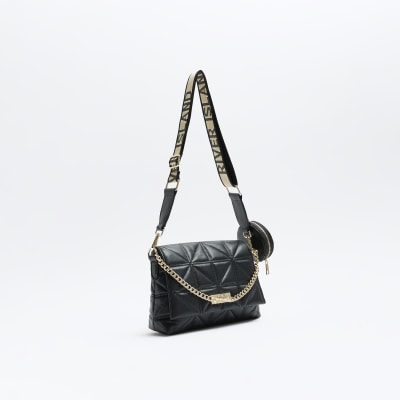 Black quilted cross body bag | River Island