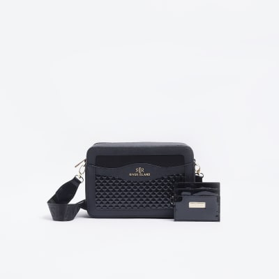 Black quilted cross body bag | River