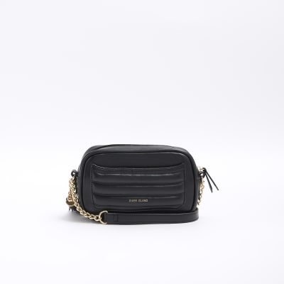 Black quilted flap front cross body bag River Island