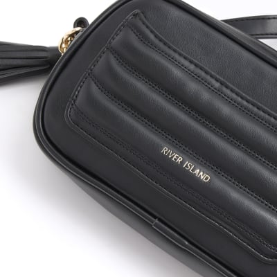 Black quilted flap front cross body bag River Island