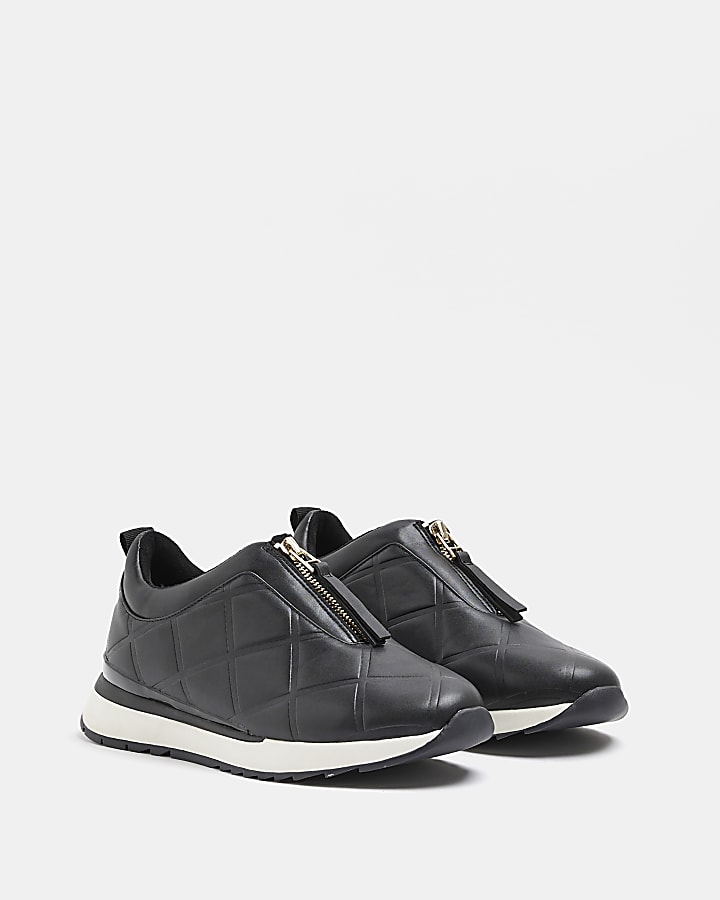 Black quilted front zip trainers