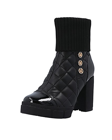 360 degree animation of product Black quilted heeled ankle boot frame-0