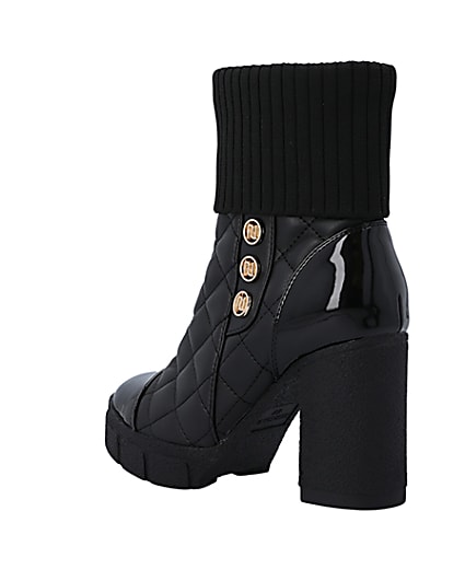 360 degree animation of product Black quilted heeled ankle boot frame-6