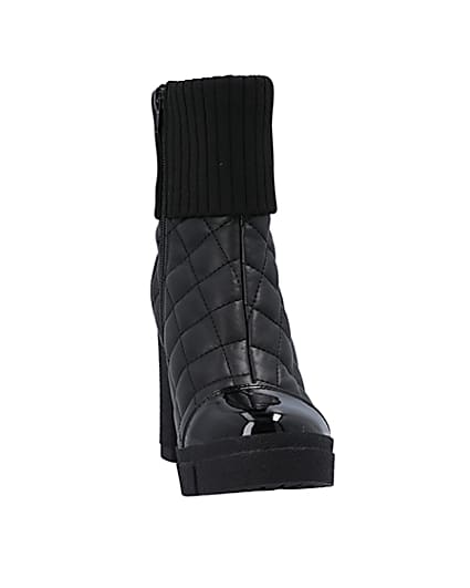 360 degree animation of product Black quilted heeled ankle boot frame-20